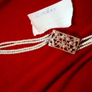 Women's costume pearl and cubic zirconia broach